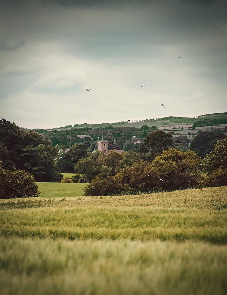 Lanscape photograph of Lancashire village with a church